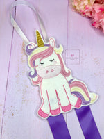 Purple unicorn bow holder