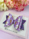 Purple puppy hair bow