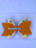Inflatable flamingo hair bow
