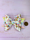 Piñata hair bow