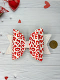 Red leopard print bow