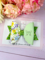 Green butterfly bow