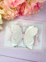 Colour changing butterfly bows