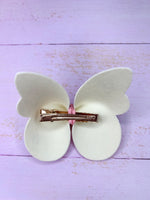 Pink butterfly clip