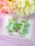 Turtle charm hair bow