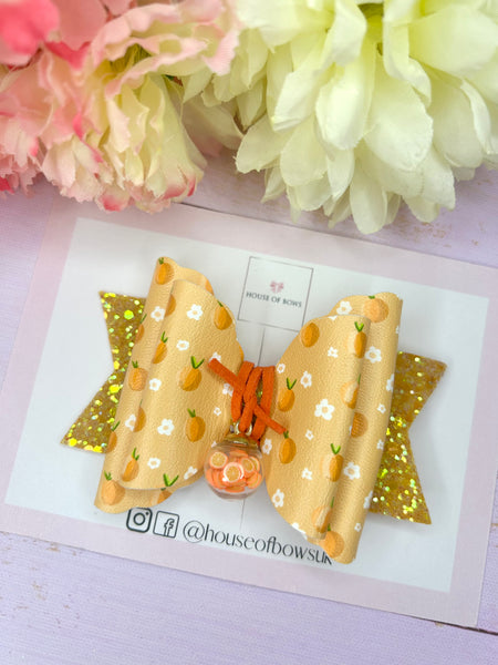 Orange charm hair bow