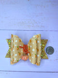 Orange charm hair bow