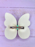 Green butterfly clip