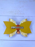Orange charm hair bow
