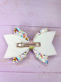 Piñata hair bow