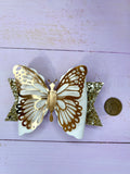 Gold butterfly bow