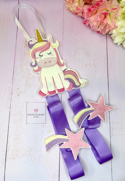 Purple unicorn bow holder