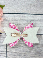 Pink leopard hair bow