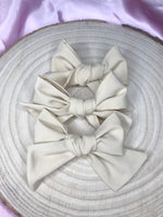 Nude hand tied hair bow