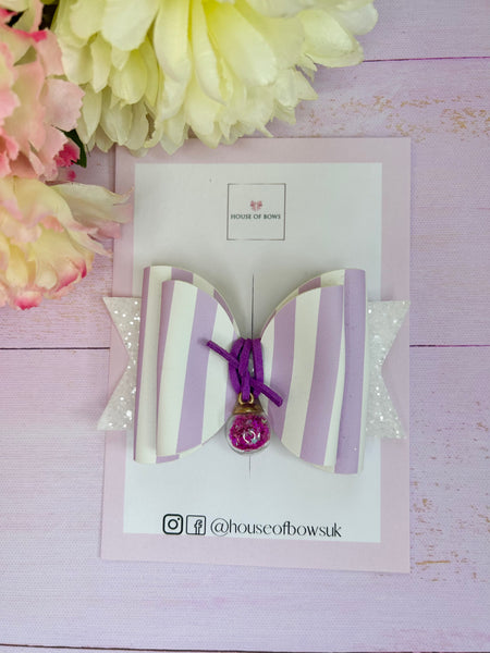 Purple bauble hair bow